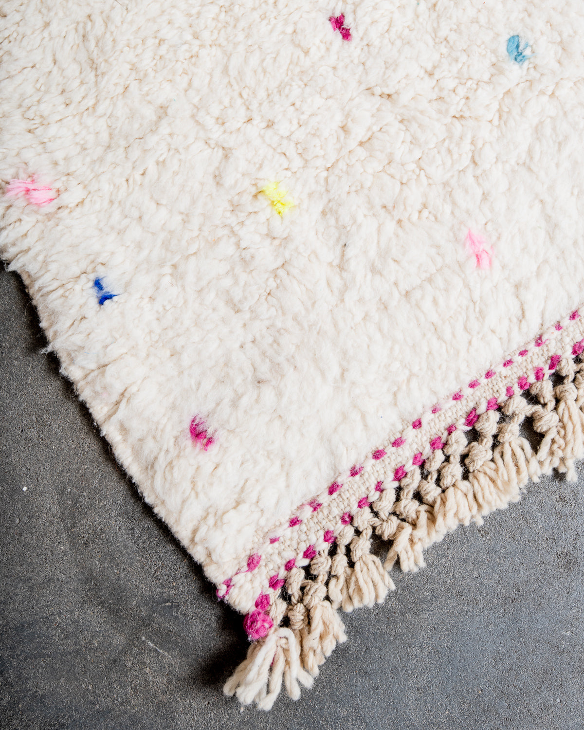 Modern, designer, handcrafted Berber rug from Morocco. Beniourain carpet with beautiful colours and patterns and fluffy wool texture.